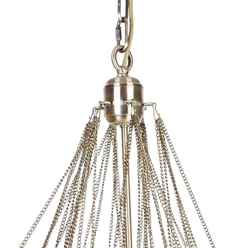 A close-up of a hanging chandelier or pendant light fixture with a brushed brass or gold-toned metal cap and multiple dangling chains against a plain white background.