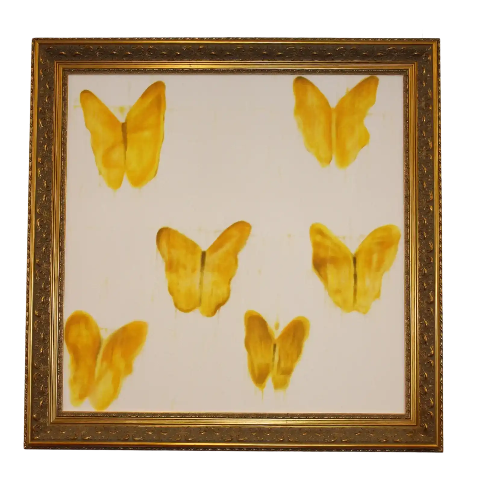 Framed wall art featuring six yellow butterfly wings arranged on a white background, enclosed in an ornate gold frame.